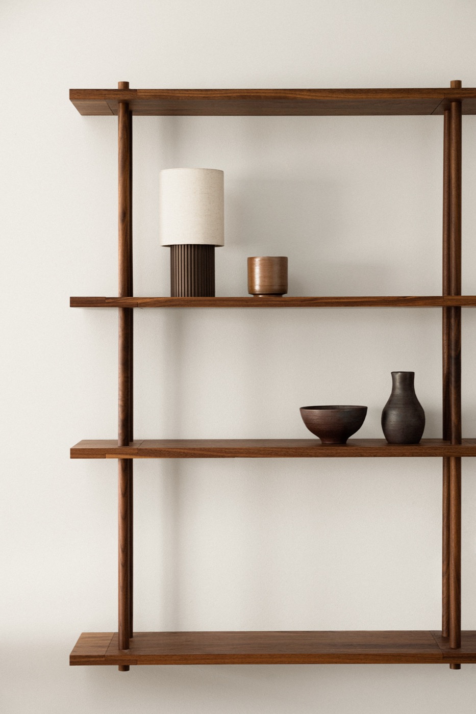 Walnut Bond on a wall, one unit with four shelves