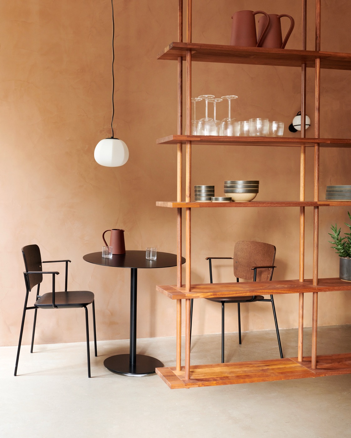 Bond as a room divider, by a small café table